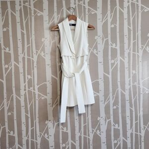 Zara: Cream Sleeveless Mini Dress.